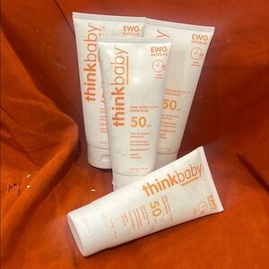 Think! Suncare Collection Orange and White SPF 50